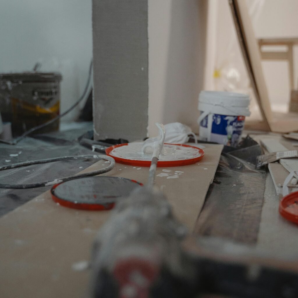 Close-up view of a construction site with tools and materials used for home renovation.